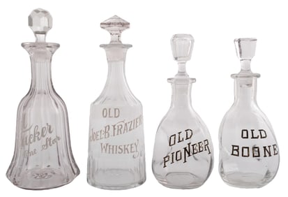 COLLECTION OF 4 CLEAR GLASS ADVERTSINING DECORATIVE BOTTLES