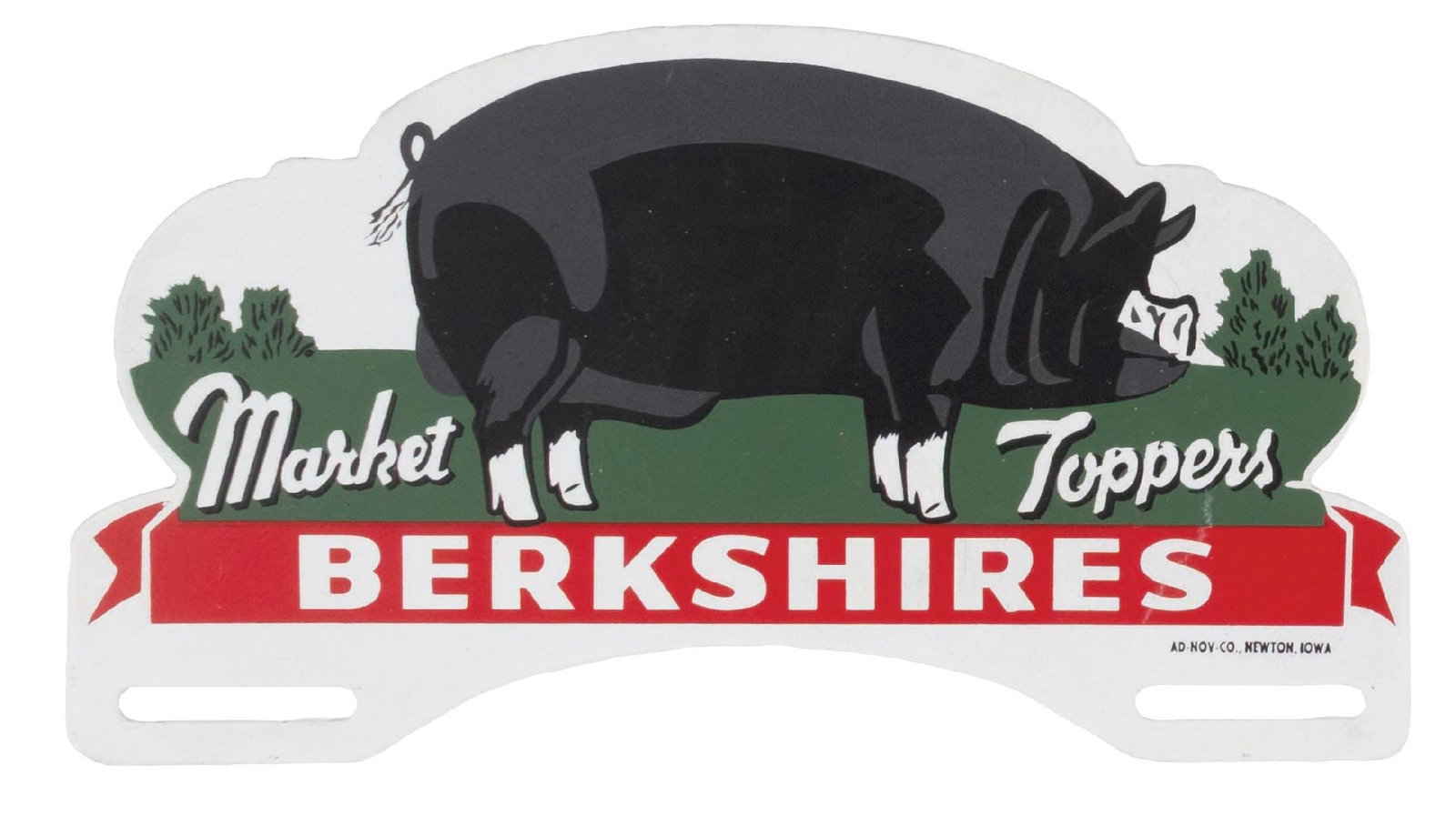 BERKSHIRES SIGN: A Berkshire Market Topper Pig sign used for license plate topper. It shows a hog, and it is marked for the Ad Novelty Company out of Newton, Iowa. CONDITION: New old stock, showing no significant dama