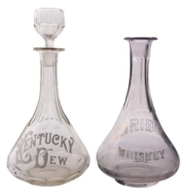 COLLECTION OF 2 PURPLE AND CLEAR GLASS LIQUOR BOTTLES