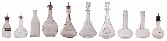 COLLECTION OF 10 CLEAR MISC BARBER BOTTLES