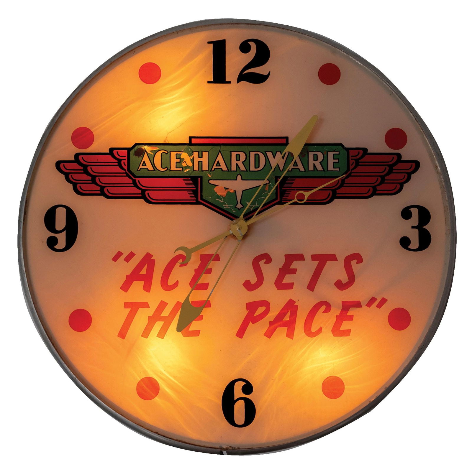 ACE HARDWARE LIGHT-UP WALL CLOCK: Made by Telesign Incorporated. CONDITION: It has the original can, clock face, glass, and clock hands. Fully operational, with a light-up clock face. The clock face shows damage, primarily to the Ace