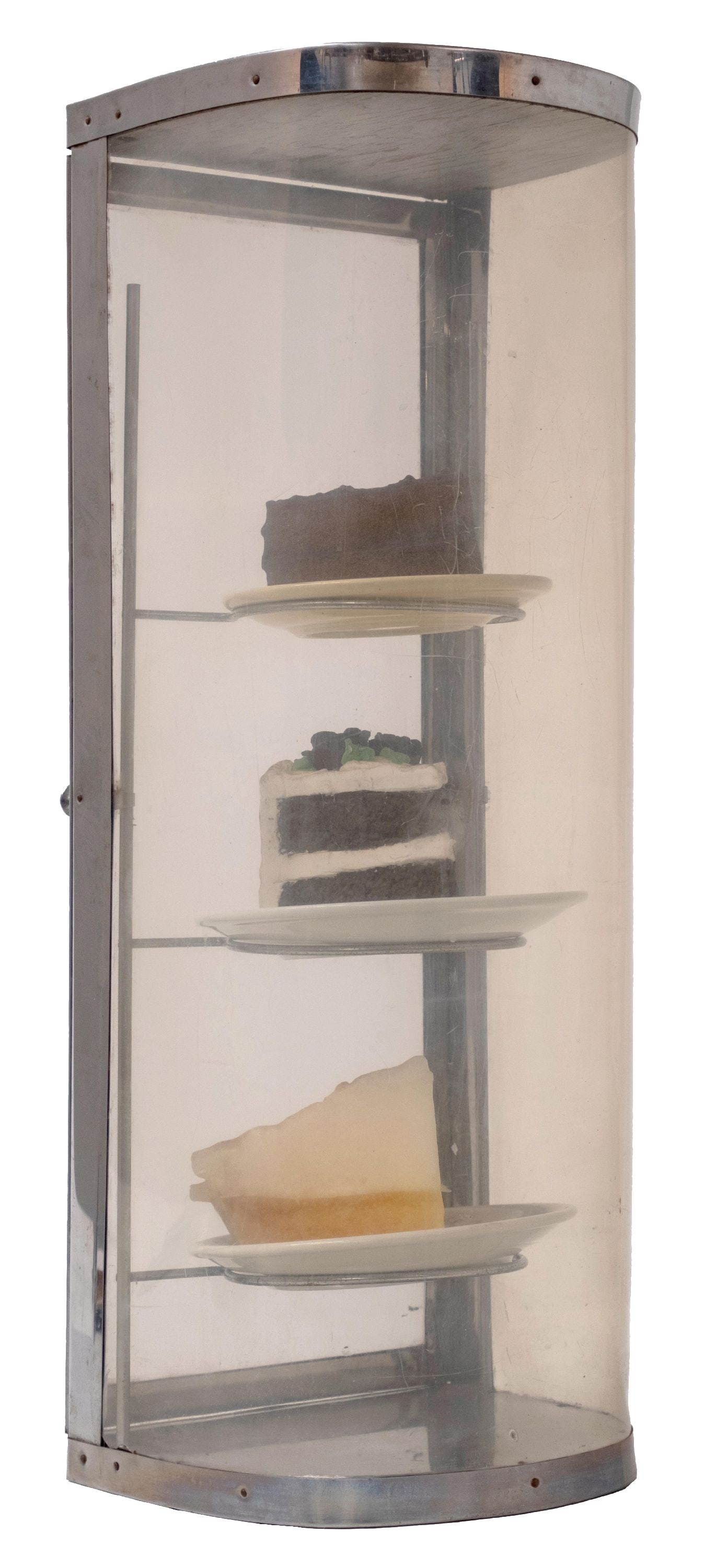 COUNTERTOP DINER PASTRY DISPLAY: CONDITION: It shows an all original pastry display with metal framing and metal framed backdoor. It has a plastic front and panel in the back. It comes complete with plates and prop-style pieces of ca
