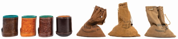 COLLECTION OF 7 LEATHER DICE CUPS W/ DICE AND 3 MONEY BAGS FILLED WITH 1¢, 5¢, 10¢