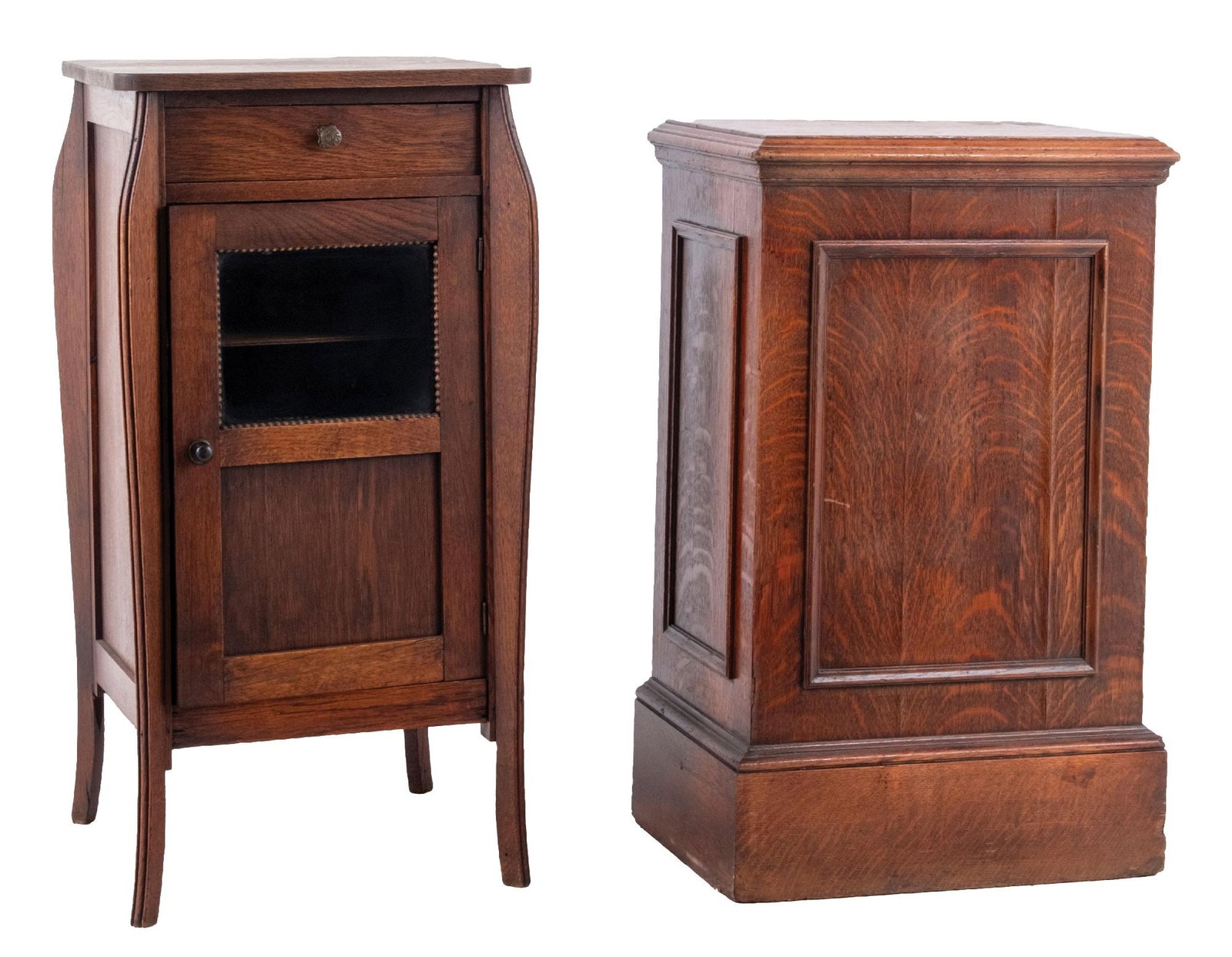 PAIR OF OAK SLOT MACHINE STANDS: C. 1910. CONDITION: (A) Oak construction, with hinged windowed front door and top drawer. It shows light wear. (Very Good). (B) Oak construction, showing some lifting to the quartersawn oak veneer. It