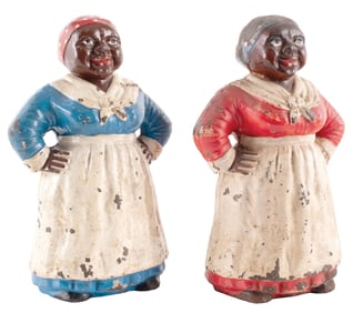 PAIR OF CAST IRON MAMY DOOR STOPS