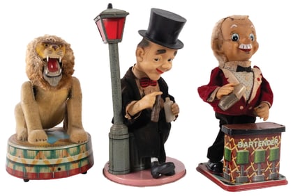 COLLECTION OF 3 BATTERY OPERATED TIN FIGURE TOYS