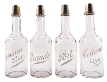 COLLECTION OF 4 CLEAR GLASS LIQUIOR BOTTLES WITH SHOT POUR TOPS