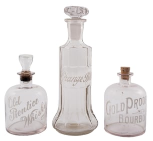 COLLECTION OF 3 SMALL VINTAGE CLEAR ALCOHOL BOTTLES