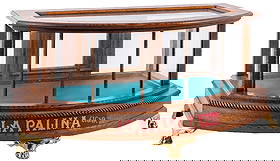 OAK CURVED GLASS COFFEE TABLE SHOWCASE WITH ADDED "PALINA CIGAR" SIGN: CONDITION: Wonderfully made coffee table display case in oak, with an applied brass tag for E & J Mfg. Co. Detroit MI. Rear access doors, curved glass front, mounted on small cast paw foot legs. With