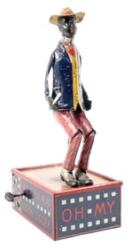 BLACK AMERICANA TIN TOY