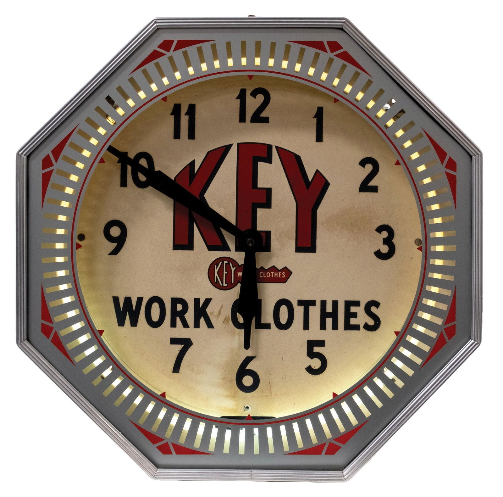 KEY WORK CLOTHES OCTAGON NEON CLOCK: CONDITION: It shows an original neon clock with original paint to the can, some remnants of original decals, oxidation, and surface rust. The clock face is original, showing some dirt and interior dus