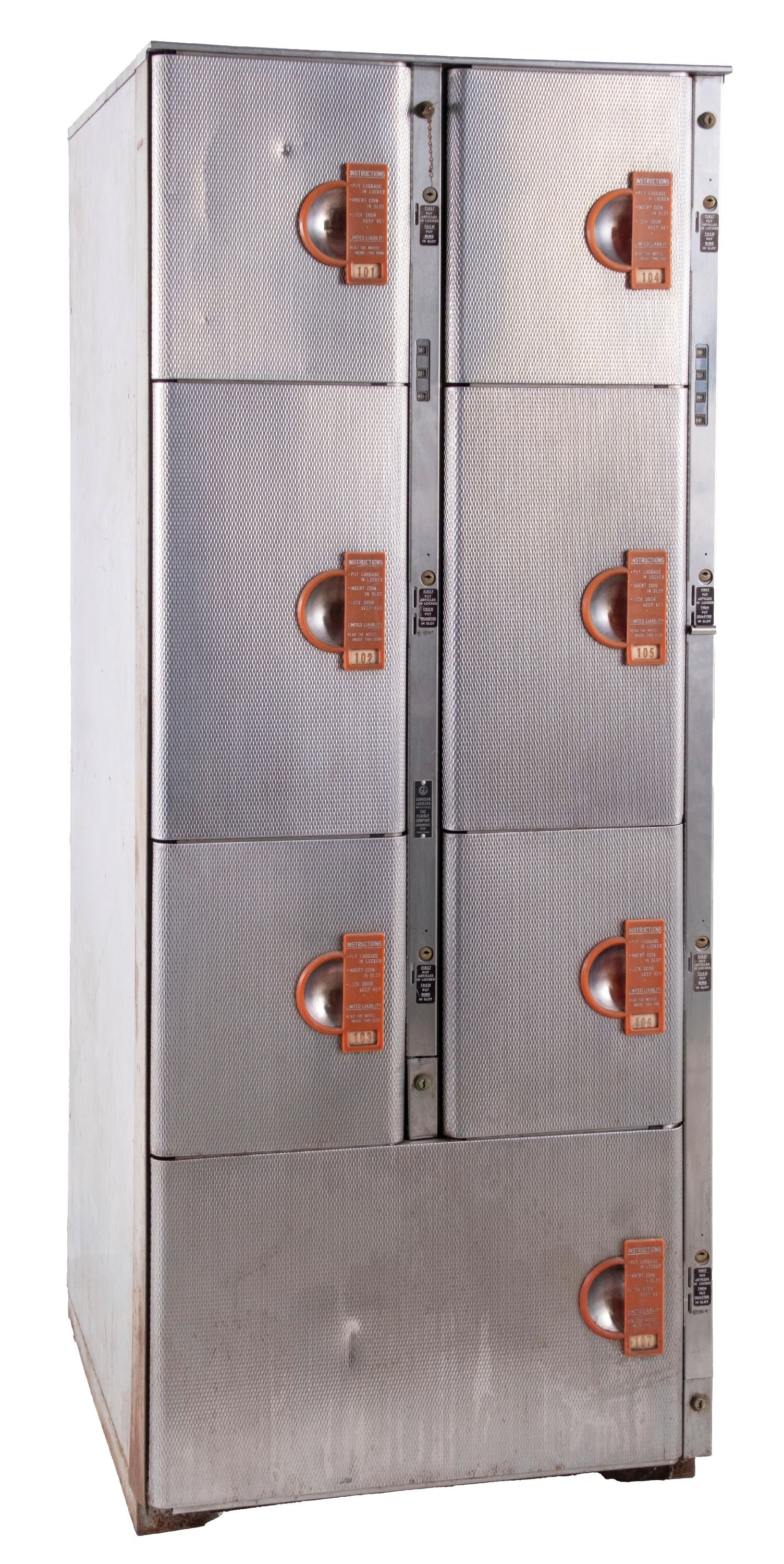 COIN-OPERATED BUS DEPOT LOCKER SYSTEM: CONDITION: Showing a 7-locker system, with some denting to the doors from use. All doors have coin system for locking. Some surface rust to the bottom edges, and overall some paint loss to the painted