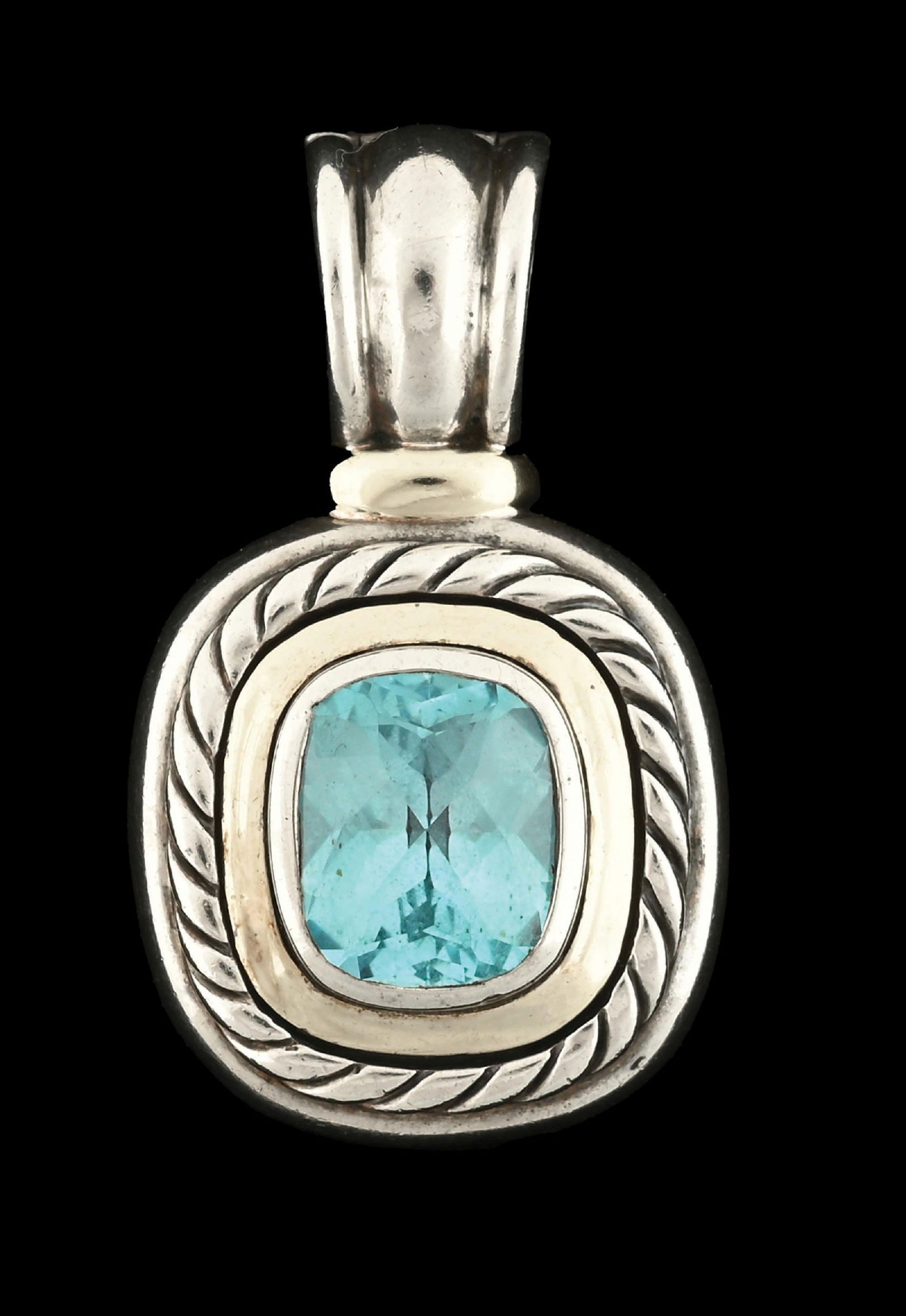 DAVID YURMAN STERLING SILVER & 14K GOLD BLUE TOPAZ CABLE PENDANT: Ladies' 14k yellow gold and sterling silver David Yurman blue topaz cable pendant/slide/enhancer. Marked "D. YURMAN 925 585". Length measures 1-1/2". Gross weight is 19.1 grams. Condition: (Very Good)