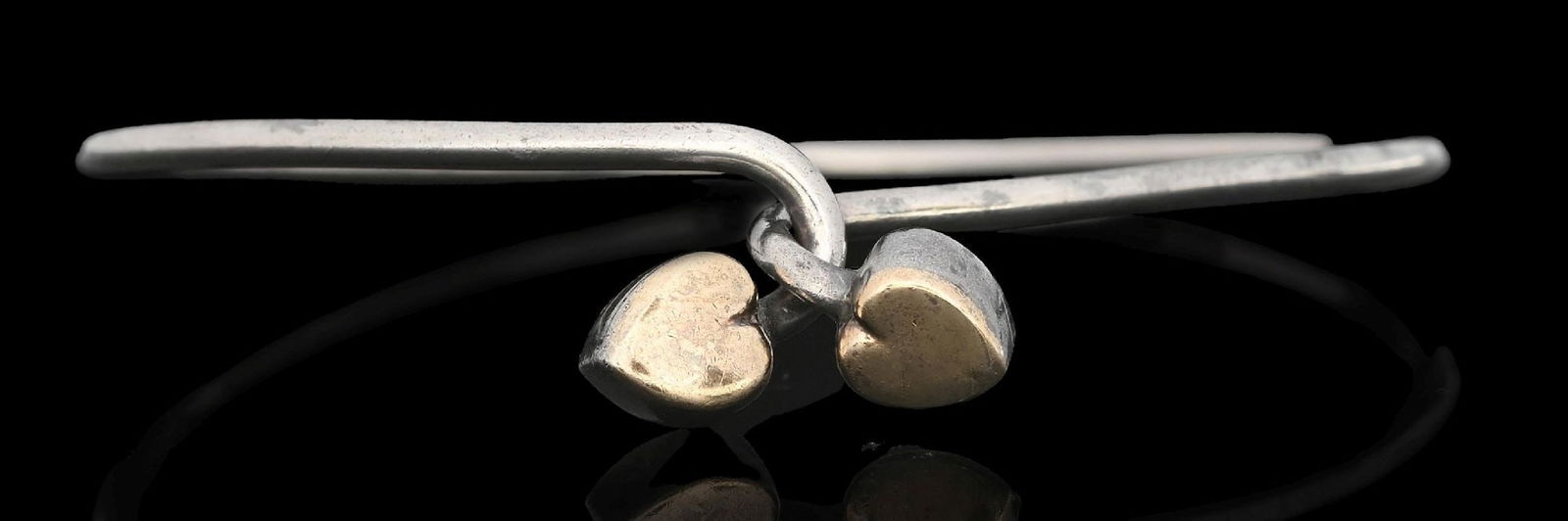 TIFFANY & CO. STERLING SILVER & 18K GOLD DOUBLE HEART BRACELET (1 of 4)