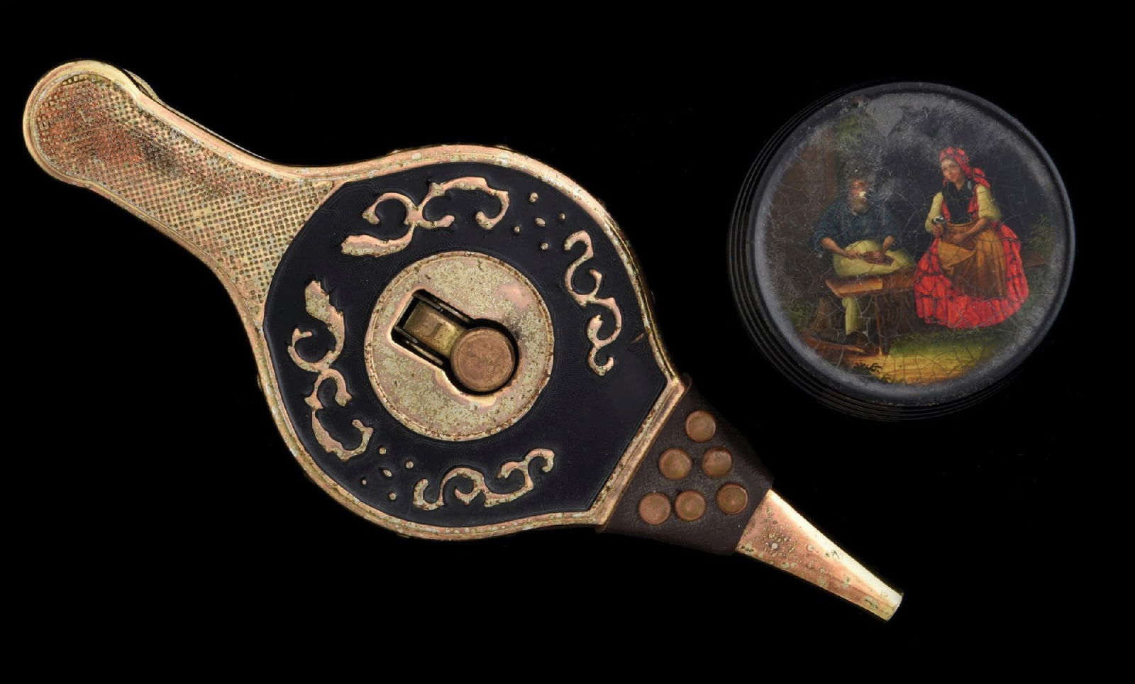 LOT OF 2: SNUFF BOX & LIGHTER: Early painted snuff box and figural lighter in shape of bellows. Condition: (Excellent). Dimensions: Largest: 3" x 7 - 1/2" x 2".