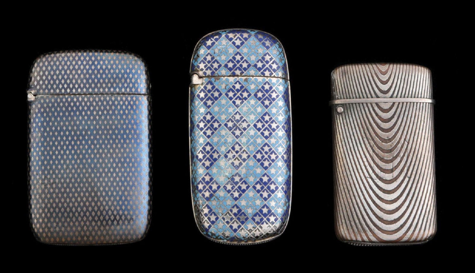 LOT OF 3: VARIOUS VINTAGE MATCH SAFES: Lot of three enameled silver match safes. Condition: (Excellent). Dimensions: Largest: 2 - 5/8" x 1 - 1/4".