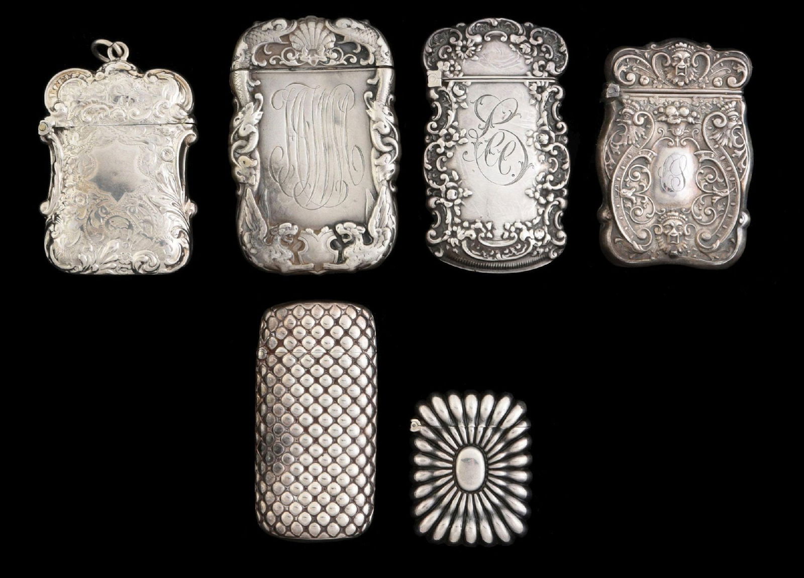 LOT OF 6: VINTAGE MATCH SAFES: Nice lot of six silver match safes. Condition: (Excellent). Dimensions: Largest: 1 - 3/4" x 2 - 3/4".