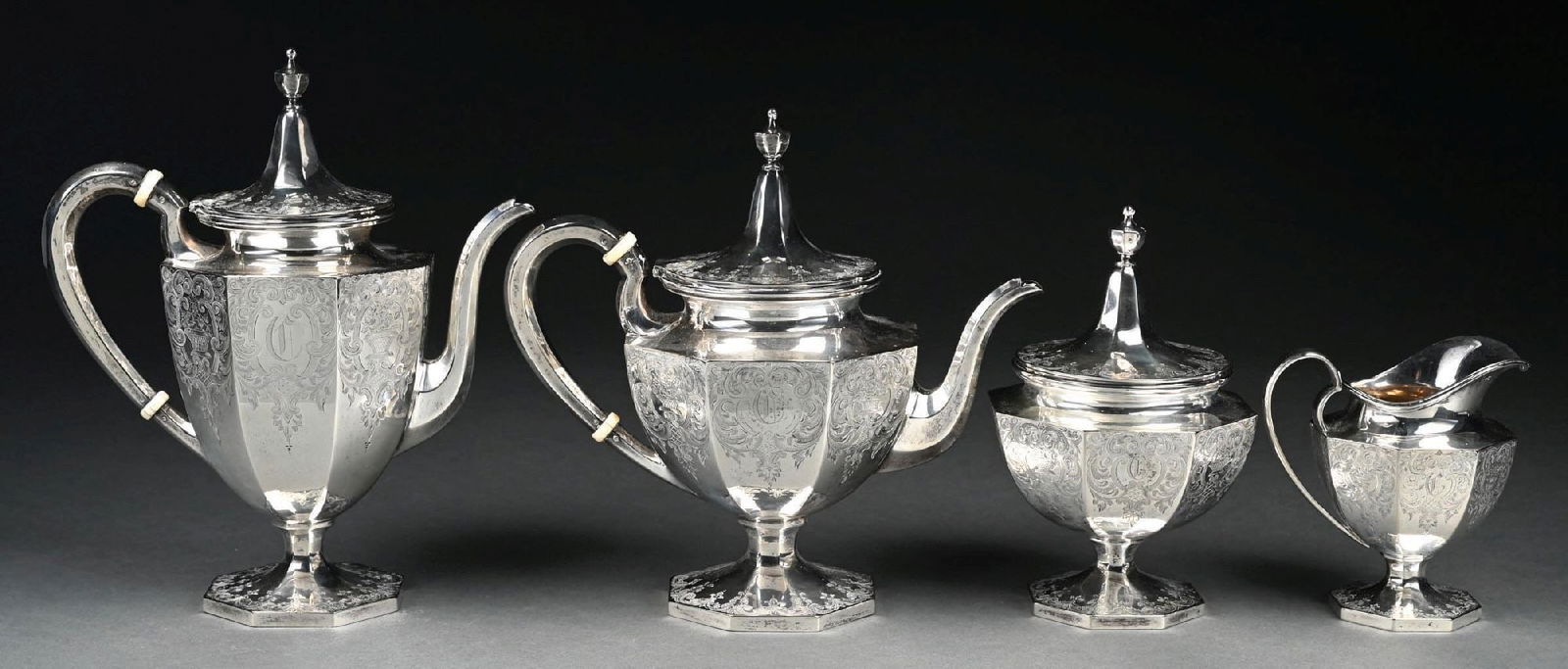 SET OF 4 PETER R. KREIDER STERLING SILVER COFFEE & TEA SET: Maker Peter R. Kreider, Philadelphia, Pennsylvania. Marked "Sterling". Tallest Dimension: 10-3/4". Gross Approximate Weight: 64.1 t oz Condition: Dimensions: Largest: 3 - 1/2" x 3 - 1/2" x 10".