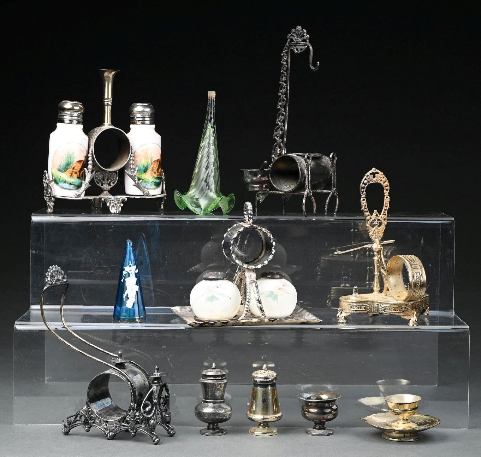 LARGE LOT OF NAPKIN RINGS WITH SALT AND PEPPER SHAKERS: Assorted napkin ring and salt and pepper lot. Condition: (Excellent). Dimensions: Largest: 5 - 1/2" x 2" x 6 - 1/4".