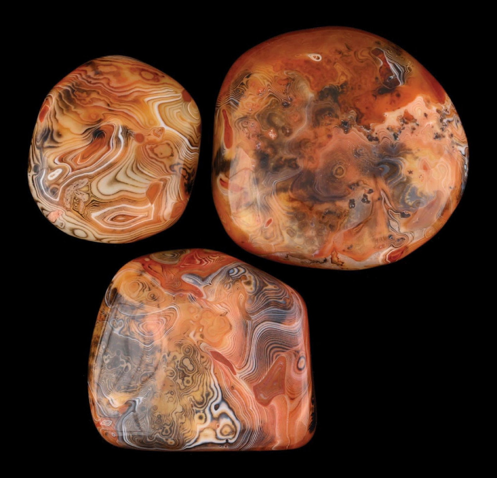 LOT OF 3: MADAGASCAR AGATES: Collection of three Madagascar Agates, polished to show of the fantastic coloring and layering on each. Condition: (Excellent). Dimensions: