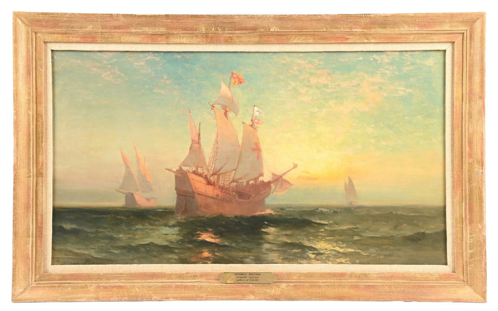 EDWARD MORAN (AMERICAN, 1829-1901): Galleon at Sunset Oil on canvas laid down on Masonite Signed lower-left "Edward Moran" 20 x 36 in. (50.8 x 91.4 cm) Framed 25-1/2 x 41-1/2 in. (64.8 x 105.4 cm) Condition Minor lifting to the canvas a