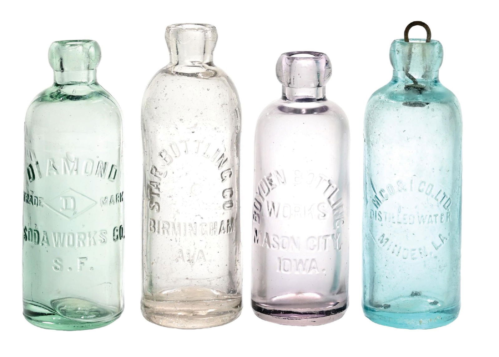 LOT OF 4: HUTCHINSON GLASS BOTTLES: (A) Clear glass embossed bottle for Diamond Sodaworks Co. The glass appears to have been tumbled and displays nicely. (8.0). (B) Clear glass embossed bottle with tombstone slug for Star Bottling Co.,