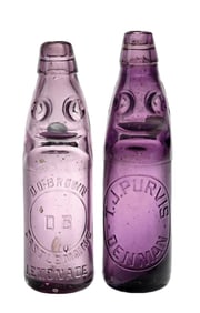 LOT OF 2: VINTAGE PURPLE GLASS CODD-NECK SODA BOTTLES