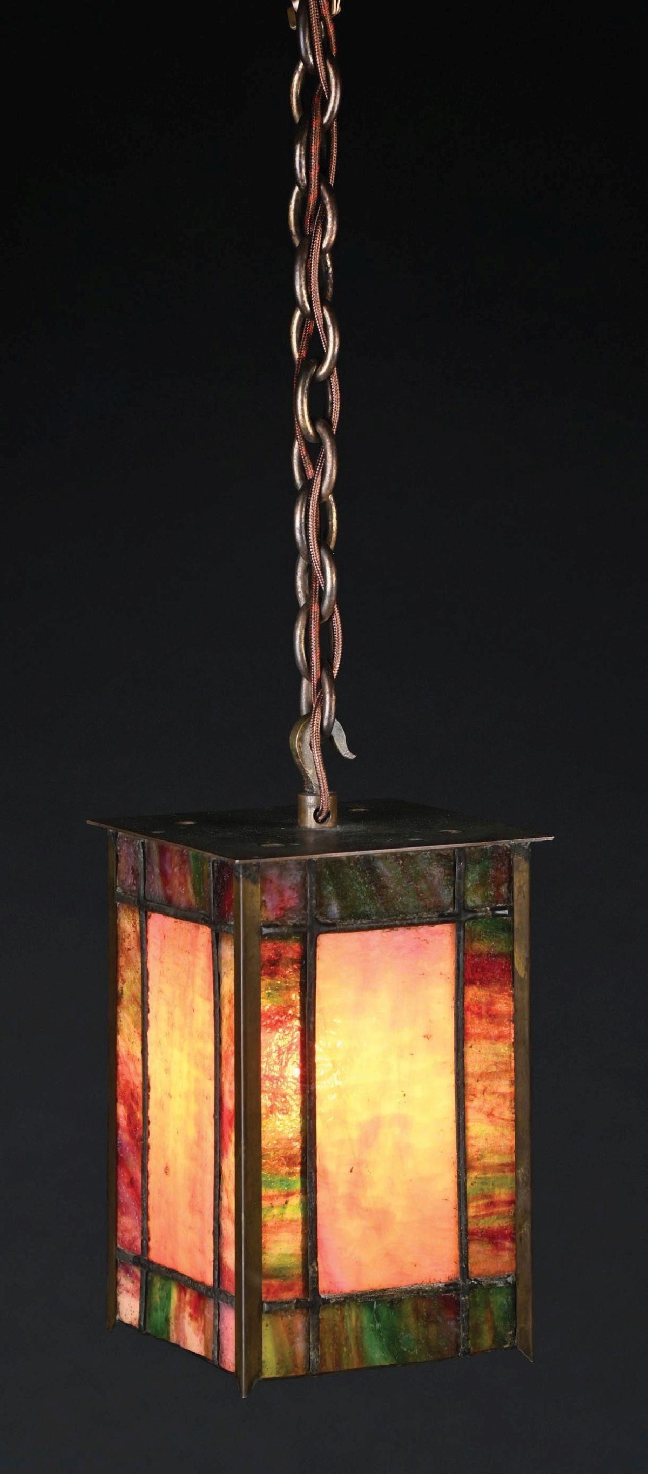 SLAG GLASS ARTS & CRAFTS HANGING FIXTURE: A beautiful arts and crafts hanging fixture. The four-sided fixture has beautiful multicolored granite-backed glass in shades of reds, greens, pinks, yellows, and creams. It has a single-socket and sh