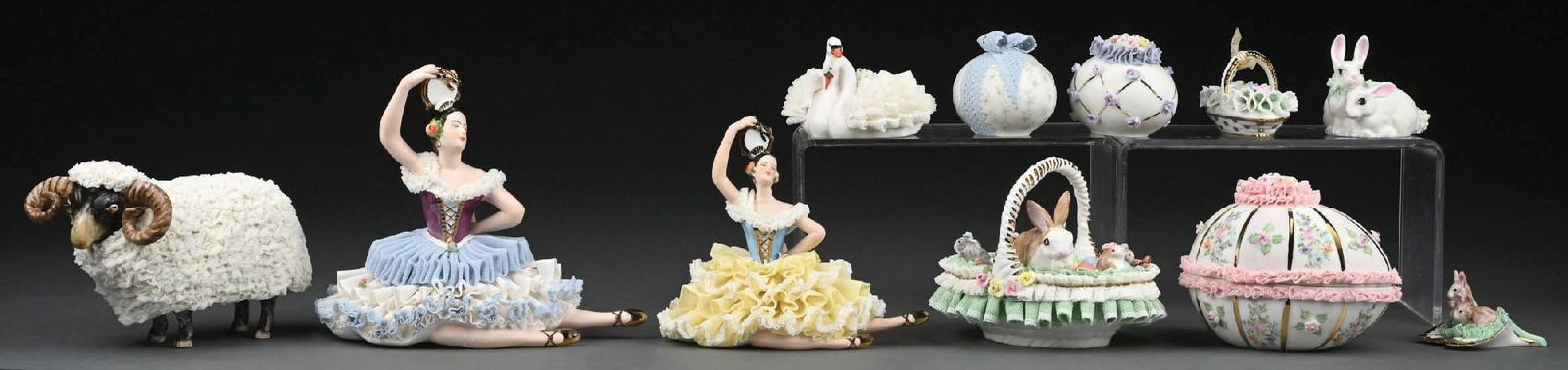 LOT OF 11: MULLER VOLKSTEDT IRISH DRESDEN LACE PORCELAIN TRINKETS AND FIGURINES.: Very nice lot of Dresden figurines. Most are stamped under base. Condition: (Excellent). Dimensions: Largest: 7 - 3/4" x 5" x 6 - 1/4".