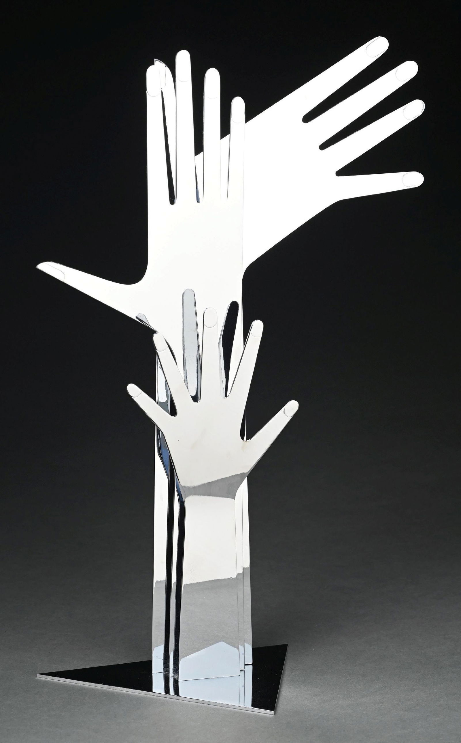 KARL F. SCHMIDT NICKEL PLATED BRASS SCULPTURE OF 3 HANDS: C. 1988. Schmidt was a master metal worker at the Hagenauer Werkstatten in Vienna and opened his own Atelier when Franz Hagenauer passed away. Marked "Werkstatten Schmidt, Wien, Made in Austria". Prov