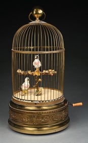 SINGING BIRD IN BRASS CAGE MUSIC BOX