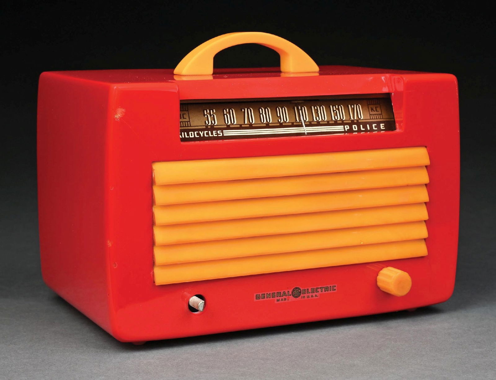 GENERAL ELECTRIC L-571 PAINTED CATALIN RADIO IN RED AND YELLOW: Red custom painted General Electric with original yellow Catalin grill, handle and 1 knob. Radio has had cracks and damage repaired, some damage still visible around grill opening. One knob missing, o