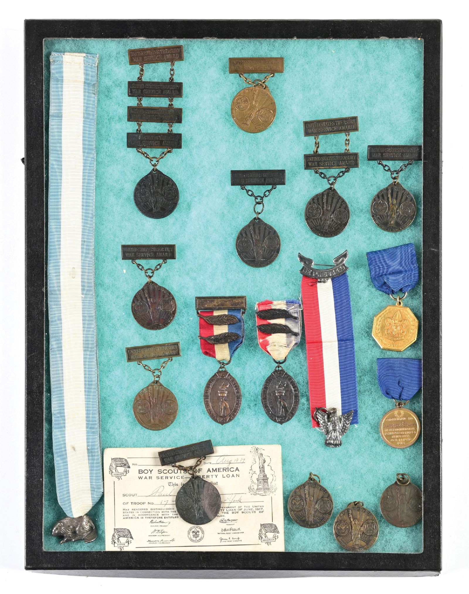 SCARCE LOT OF (17) WWI ERA BOY SCOUTS OF AMERICA MEDALS AND EPHEMRA.: This organization was founded in America in 1910. When America entered the war in 1917, it was the duty of every Scout to Save a Soldier. This was done with various collecting drives such as paper, me