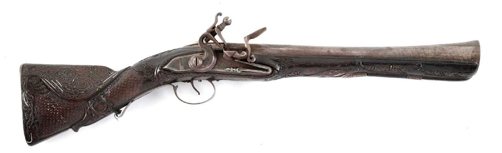 (A) ORNATE, SILVER INLAID, CARVED & INCISED MIDDLE EASTERN FLINTLOCK BLUNDERBUSS: This hand held blunderbuss features the ornately inlaid barrel and lock, a silver inlaid, carved, incised and stippled one piece walnut stock. All furniture and hardware are made of iron. There is no