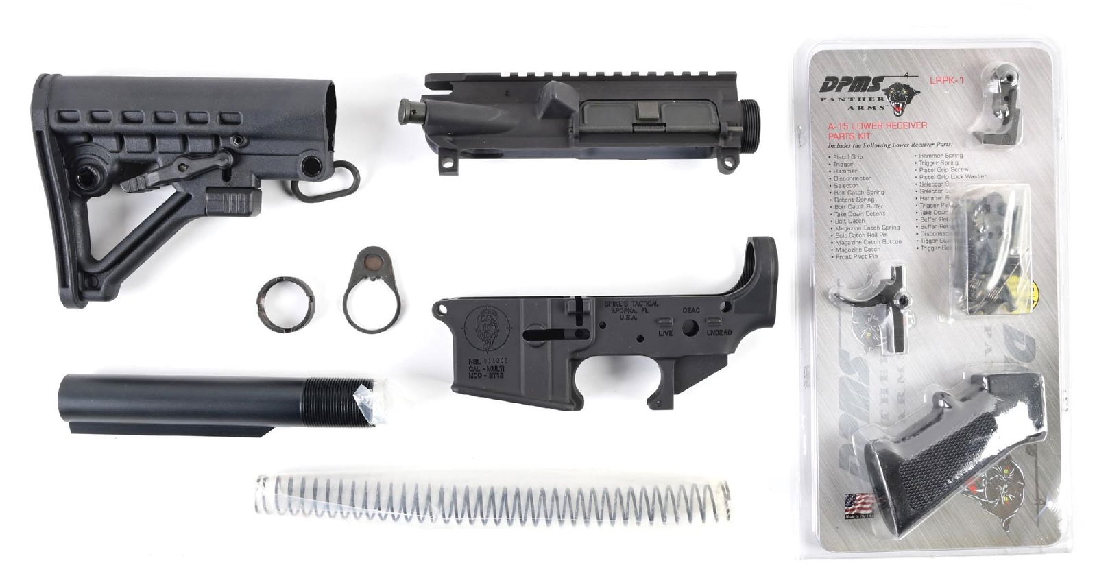 (M) SPIKES TACTICAL ST-15 ZOMBIE EDITION AR LOWER AND PARTS.: Lot consists of: Zombie themed Spikes Tactical stripped lower, Spikes Tactical flat top upper, buffer tube with parts, DPMS lower parts kit, A2 style pistol grip, and a telescoping stock. CONDITION: E