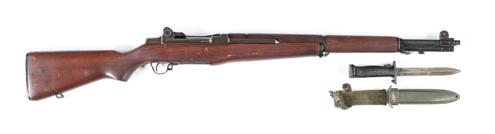 (C) U.S. SPRINGFIELD M1 GARAND SEMI-AUTOMATIC RIFLE.: Late, circa 1955 production. Springfield barrel dated "3 55". Standard post-War configuration with Springfield parts. Walnut stock marked with a strong DOD cartouche and circle "P" firing proof. A rac