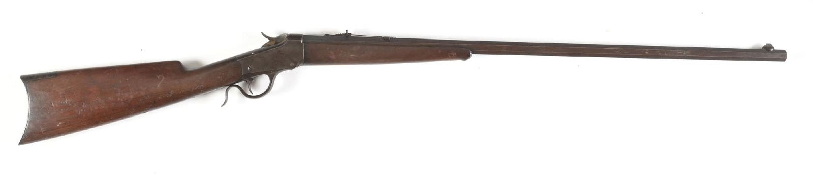 (A) WINCHESTER MODEL 1885 LOW WALL SINGLE SHOT RIFLE.: Dates to 1891. Features a tapered octagon No. 1 barrel, a Lyman dovetailed front sight, flat top sporting rear sight, adjustable trigger, walnut stock with rifle butt plate and matching forearm with e