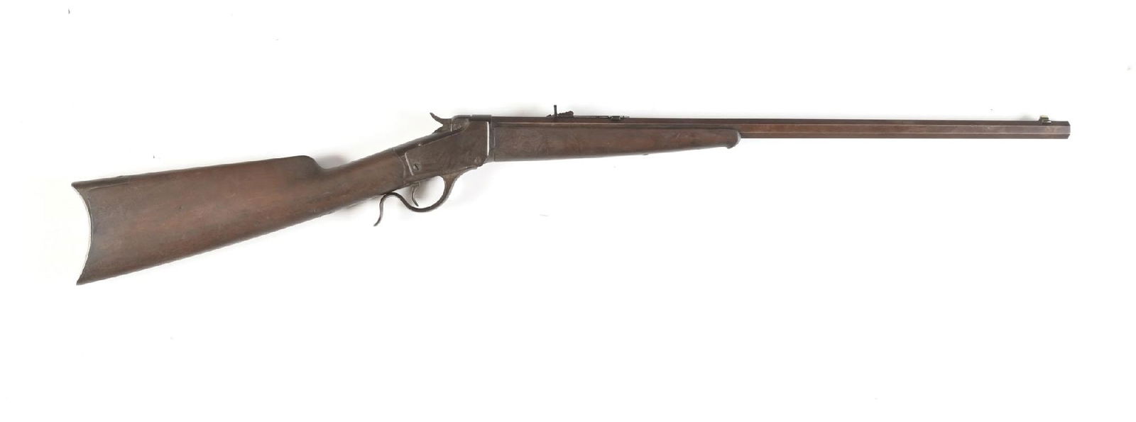 (A) WINCHESTER MODEL 1885 LOW WALL SINGLE SHOT RIFLE.: Dates to 1886, second year production. Features a No. 1 tapered octagon barrel, Winchester German silver dovetailed front sight, replaced semi buckhorn rear sight, walnut stock with rifle butt plate a