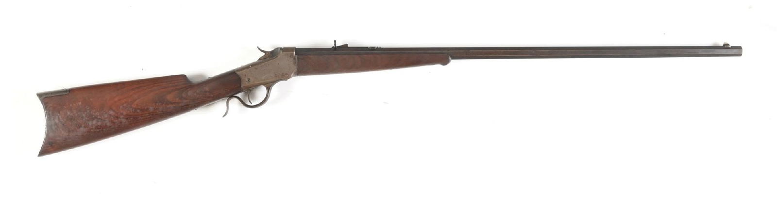 (A) WINCHESTER MODEL 1885 LOW WALL SINGLE SHOT RIFLE.: Dates to 1889. Features a No. 1 tapered octagon barrel, Winchester German silver dovetailed front sight, semi buckhorn rear sight, walnut stock with rifle butt plate and matching forearm with ebony in