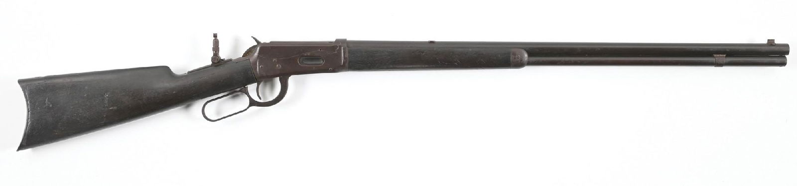 (C) WINCHESTER MODEL 1894 LEVER ACTION RIFLE IN .25-35.: Dates to 1904. Standard rifle with blue finish, round barrel, full tube, replaced dovetailed front sight, rear slot filled and sporting a Marbles tang sight. Walnut stock has rifle butt plate with mat