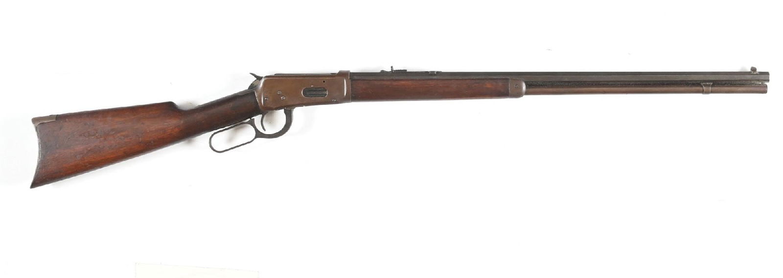 (C) WINCHESTER MODEL 1894 LEVER ACTION RIFLE.: Dates to 1914. Features the full octagon barrel, full tube magazine, dovetailed front sight, semi buckhorn rear sight, blue finish, walnut stock, rifle butt plate and matching forearm. CONDITION: Very