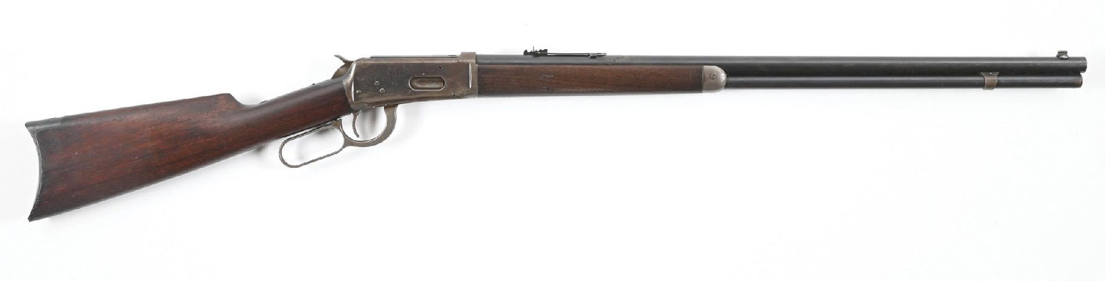 (C) WINCHESTER MODEL 1894 LEVER ACTION RIFLE.: Dates to 1904. This early gun was sent back to the factory for a new barrel with the post 1905 PW proof stamped on barrel and frame. Now sports a Model 94 round barrel, full tube, dovetailed bead fron