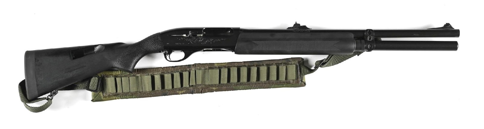 (M) REMINGTON 1100 SKEET-B SERIES SEMI-AUTOMATIC SHOTGUN: This Skeet shotgun now sports the sighted deer slug barrel with a dovetailed ramp front and adjustable ramp rear. A full length tube was also added. This gun has the pistol grip nylon stock with match