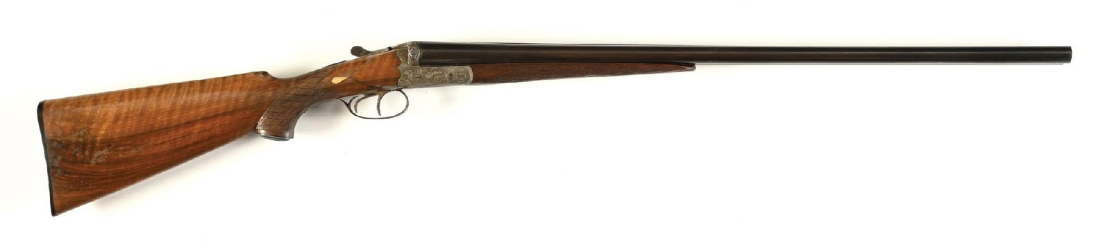 (C) VINZ URBAS FERLACH SIDE BY SIDE 12 GAUGE SHOTGUN.: Vinz Urbas was a famed gunmaker from Ferlach, Austria. This fine double features an exquisitely engraved scalloped box lock receiver , double triggers, manual extractor, blued barrels, solid rib, sing