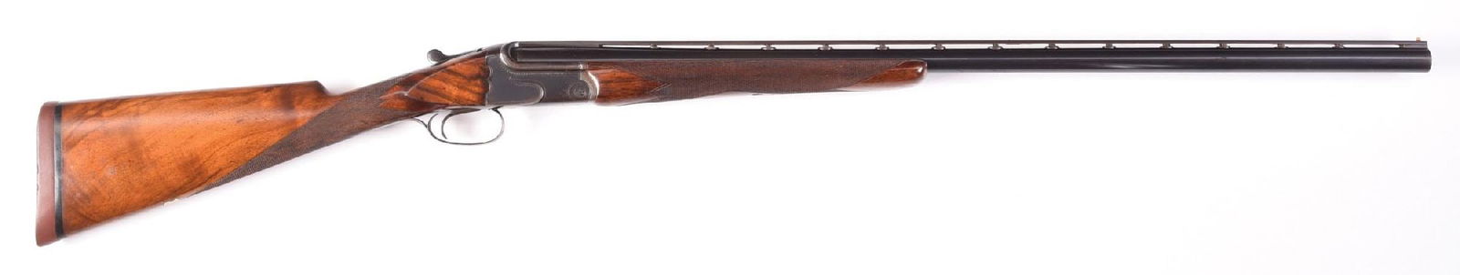 (C) PRE-WAR GERMAN SINGLE BARREL TRAP SHOTGUN: This quality trap gun features a full matted vent rib, dual white bead sights, a scalloped box lock action that is lightly engraved. The walnut stock is a checkered straight grip with period NOSHOC re