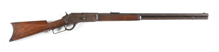 (A) WINCHESTER MODEL 1876 LEVER ACTION RIFLE.