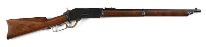 (A) RESTORED WINCHESTER MODEL 1876 SADDLE RING CARBINE.