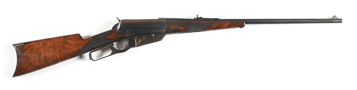 (C) DELUXE WINCHESTER MODEL 1895 LEVER ACTION RIFLE.