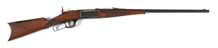 (C) FACTORY ENGRAVED SAVAGE MODEL 1899 LEVER ACTION RIFLE.