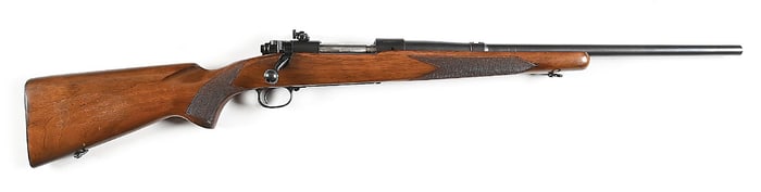 (C) EXPERIMENTAL WINCHESTER MODEL 70 BOLT ACTION RIFLE IN .22 / T-65 DUPLEX CARTRIDGE (1953).